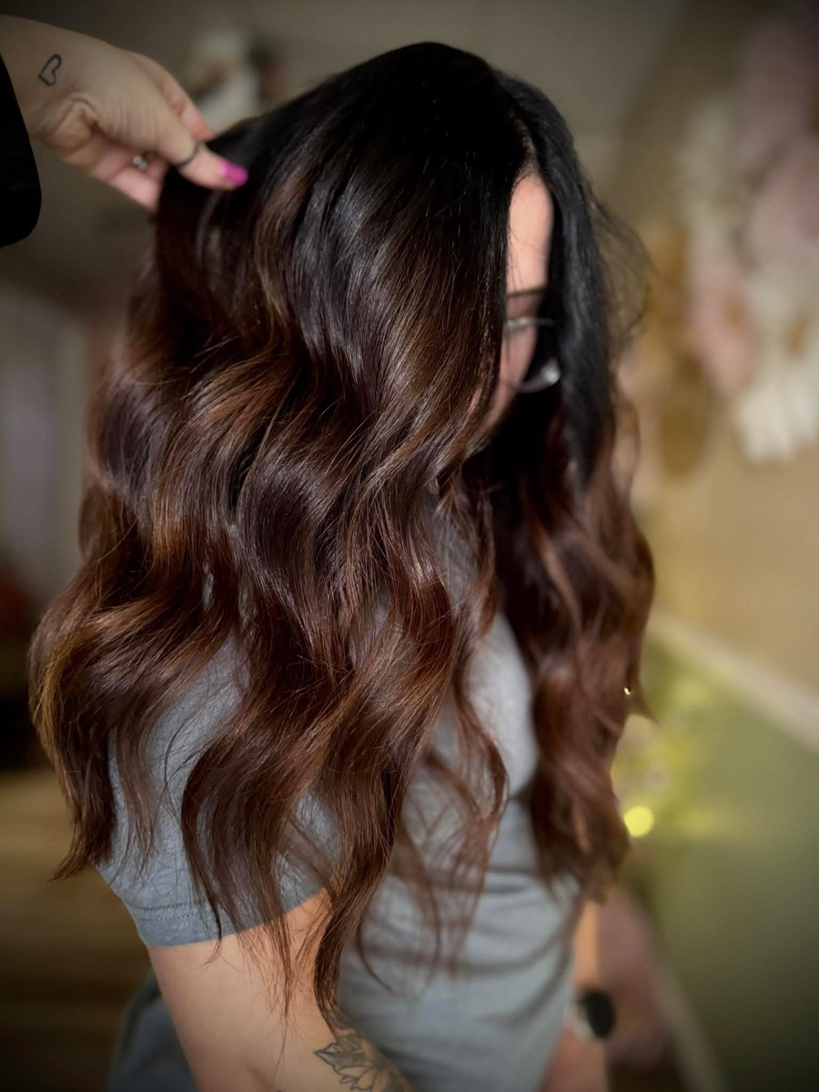 Rich brunette with dimensional waves