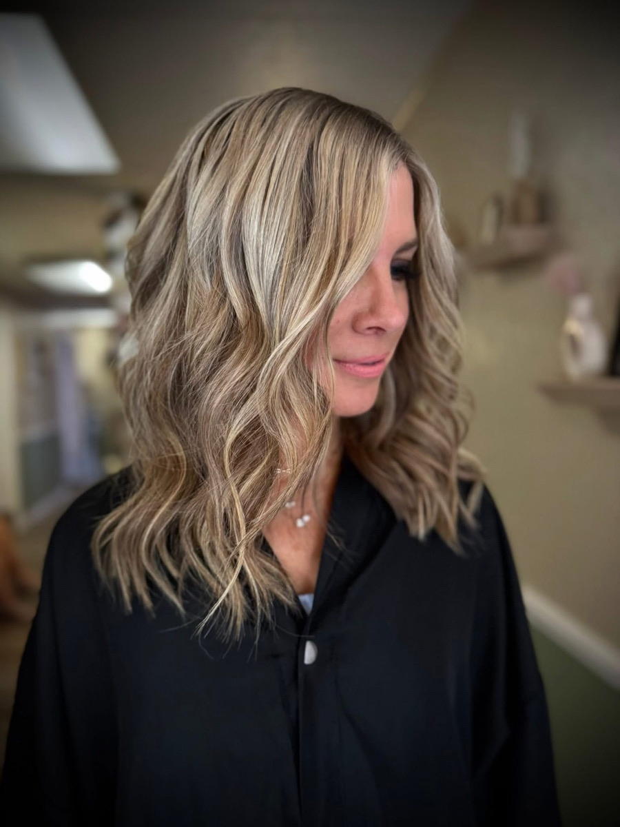 Shoulder-length blonde with soft waves